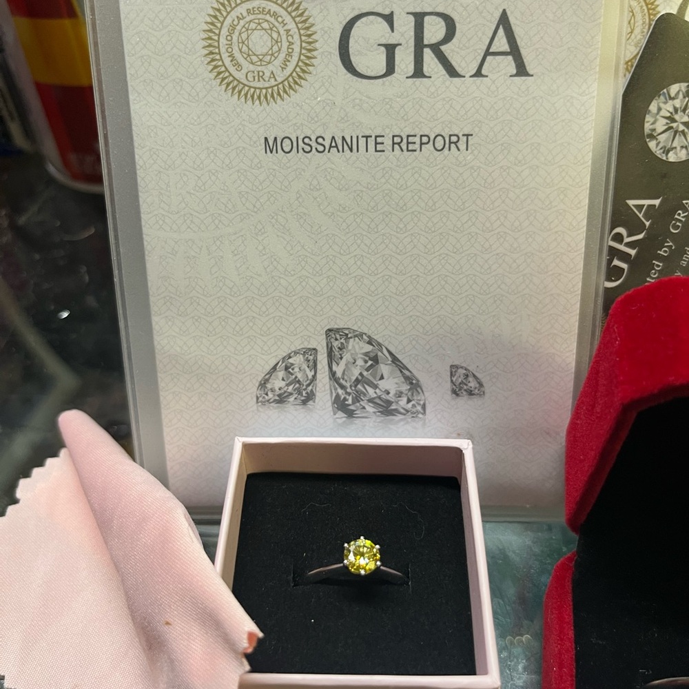 Elegant Yellow Moissanite Ring set in yg.925 Silver